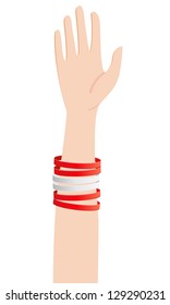 Human hand with Austrian flag rubber wristbands.