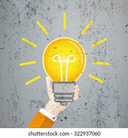 Human hand with bulb on the concrete. Eps 10 vector file.