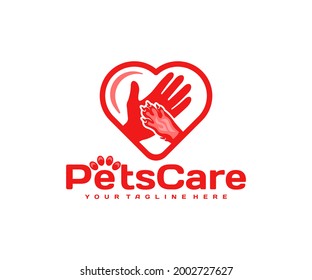 Human hand and dog's paw in the heart, logo design. Pet shelter, pet care and animals, vector design and illustration
