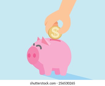 Human hand drop coin in piggy bank