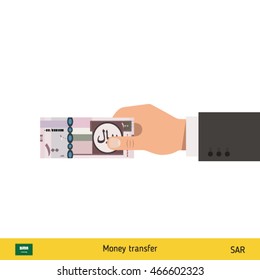 Human hand gives money vector illustration. Saudi Arabian riyal banknote.
