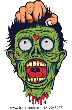 Human hand hold the head of a dead zombie