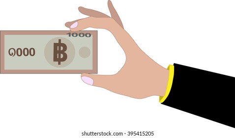 Human hand holding 1000 bath bank note. Bath is the national currency of Thailand