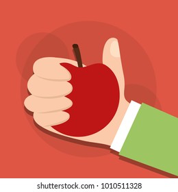 human hand holding apple fruit