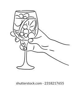 Human hand holding a cocktail glass. Sketch-style illustration. Vector.