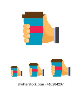 Human hand holding disposable cup