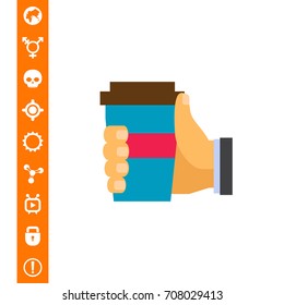 Human hand holding disposable cup