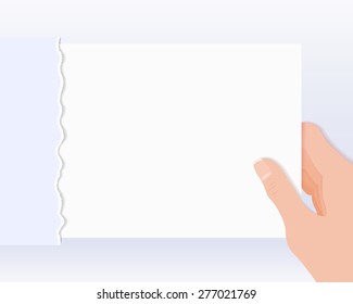 Human hand holding envelope with paper