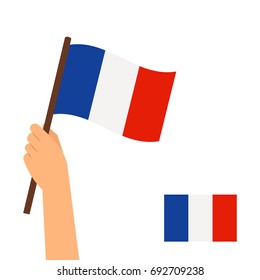 Human hand holding flag of France country isolated on white background. Vector illustration