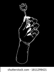 Human hand holding a key to the door. Hand drawn vector illustration. Mystic and occult hand. Mystical print. T-shirt design.