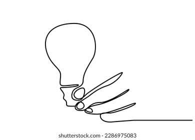 human hand holding light bulb lamp