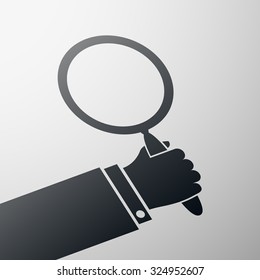 Human hand holding a magnifying glass. Stock vector image.