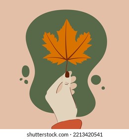 Mano humana sosteniendo una hoja de arce. Vibes de otoño. Ilustración vectorial, diseño plano