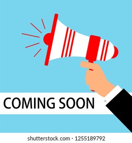 Human hand holding megaphone. Social media marketing. Vector illustration in flat design. Sign for the coming soon.