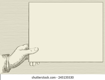 Human hand holding a page. Vector background at retro engraving style.