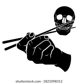 Human hand holding human skull with chopsticks. Creative concept. Black and white silhouette.