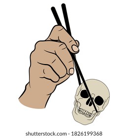 Human hand holding human skull with chopsticks. Creative concept for unhealthy food.