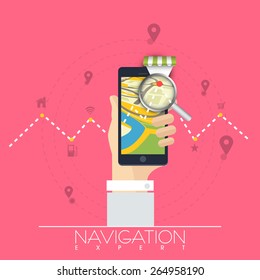 Human hand holding smartphone with compass on pink background.