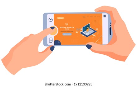 Human hand holding smartphone with webpage on topic of industrial internet of things, data protection concept opened laptop and closed padlock symbol. Modern digital technologies, reliable software
