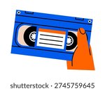 Human hand holding video cassette illustration. Flat vector old vhs record in arm sticker doodle. Hand drawn analog media archive. Vintage technology icon. Isolated.