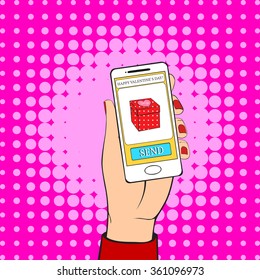 Human hand holding a white mobile phone with gift icon on the screen. Vector illustration. Valentine`s day background in retro style.