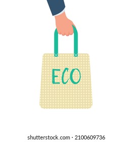 Human hand holds ecological bag. Reusable tissue bag. Vector illustration flat design. Isolated on white background. Ecobag fabric, cloth cotton.
