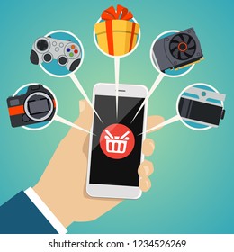 Human hand holds smart phone with shop basket icon on the screen. Vector illustration of online shopping concept. Buying online with mobile phone with a lot goods icons in flat cartoon style.