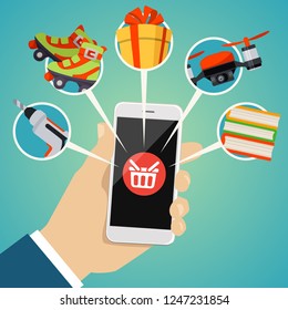 Human hand holds smart phone with shop basket icon on the screen. Vector illustration of online shopping concept. Buying online with mobile phone with a lot goods icons in flat cartoon style.