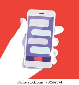 A human hand holds a smartphone with text balloon on screen. Vector illustration of a smartphone with chat in a man hand. Modern phone in the palm of your hand. Infographics for flat design