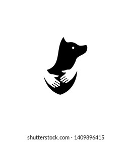 human hand hugs dog in negative space logo vector icon illustration