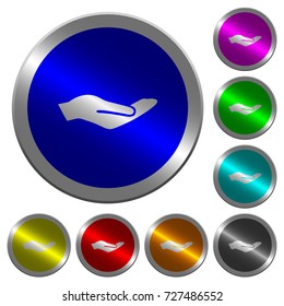 Human hand icons on round luminous coin-like color steel buttons