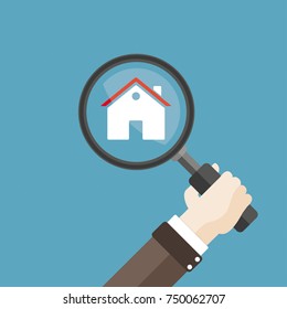 Human hand with loupe and a house. Eps 10 vector file.