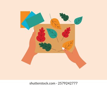 Human hand is making crafts with origami paper, he cut it out like a leaf and then glued it to the paper.
design, vector, illustration