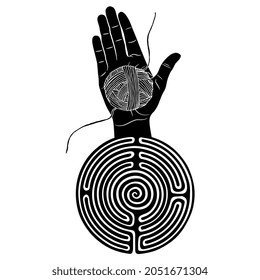 Human hand with open palm holding yarn ball emerging from a round spiral maze or labyrinth symbol. Ariadne thread. Black and white negative silhouette. Creative concept.