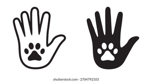 Mano humana y icono de la impresión de la pata. que representa el cuidado animal y el amor.
