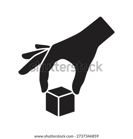 Human hand picking up cubic block showing selection choice logical solution interactive game play puzzle piece arrangement conceptual design