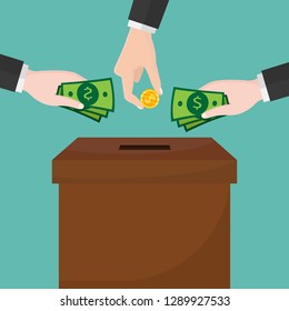 Human hand putting golden coin money with dollar sign into donation paper cardboard box. Helping hands concept. Donate and help pets animals.