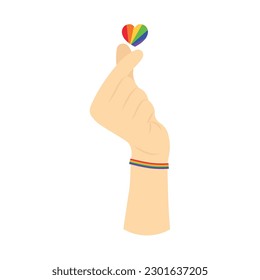 Menschliche Hand mit Regenbogenherz auf weißem Hintergrund. LGBT-Konzept