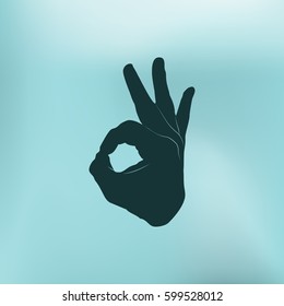 Human hand, showing OK sight, fingers showing symbol of a great state. OK icon