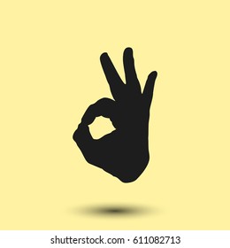 Human hand, showing OK sight, fingers showing symbol of a great state. OK icon