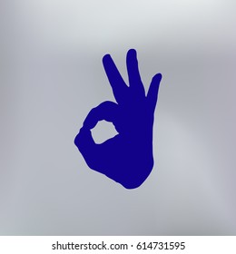 Human hand, showing OK sight, fingers showing symbol of a great state. OK icon