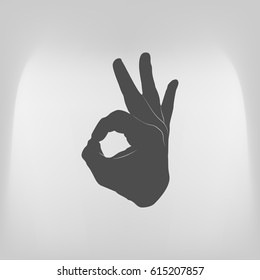 Human hand, showing OK sight, fingers showing symbol of a great state. OK icon