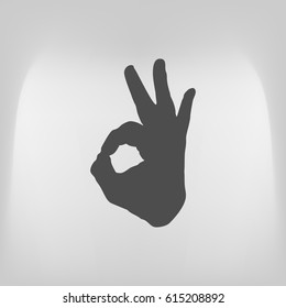 Human hand, showing OK sight, fingers showing symbol of a great state. OK icon