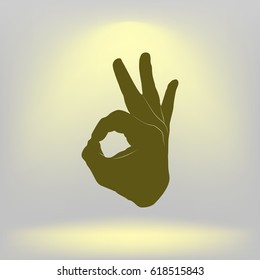 Human hand, showing OK sight, fingers showing symbol of a great state. OK icon