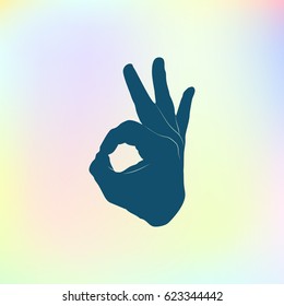 Human hand, showing OK sight, fingers showing symbol of a great state. OK icon