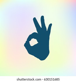 Human hand, showing OK sight, fingers showing symbol of a great state. OK icon