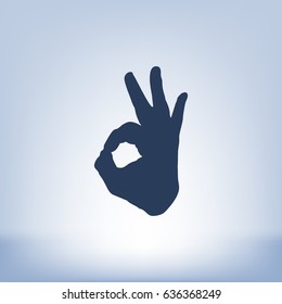 Human hand, showing OK sight, fingers showing symbol of a great state. OK icon