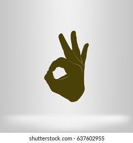 Human hand, showing OK sight, fingers showing symbol of a great state. OK icon