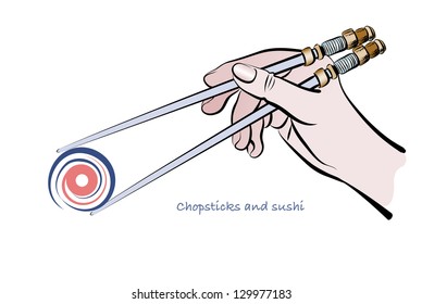 Human hand skillfully holds eastern chopsticks. Japanese sushi.