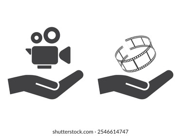 Human hand support video camera and film-reel icon